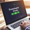 A person running an antivirus scan on Windows laptop