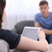 Psychologist using table during therapy session