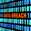 Red text that says Data Breach in lines of binary code.