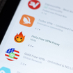 A closeup of free VPN apps like Hola and Turbo VPN on smartphone