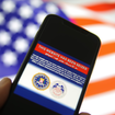 Phone screen showing a website has been seized by the FBI.