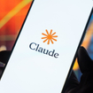 Claude logo displayed on the screen of a smartphone.