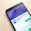 VPN: Fast and Unlimited NordVPN app on Google Play Store website displayed on phone screen.