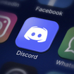 A closeup of Discord app icon on smartphone