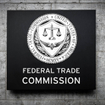 Closeup of the FTC logo on a building
