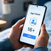 Hands Holding a Smartphone, Pop-Up Age Verification Window with Text is Displayed on Screen.