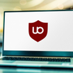 Laptop computer displaying logo of uBlock Origin.