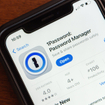 1Password app is displayed in the App Store on an iPhone.