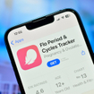 Flo period tracking app download page on the screen of an iPhone.