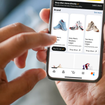 User selecting new Amazon "Buy for Me" feature on phone screen.