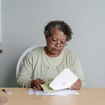 Granny's counting the money.