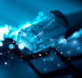 A close-up photo of an Ethernet cable and fiber optic cables on top of a computer keyboard