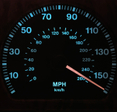 A close-up shot of a lit-up speedometer on a car&#x27;s dashboard. The needle is sitting at just over 150 miles per hour to show fast speeds.