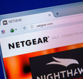 Homepage of NETGEAR website on the display of a PC.