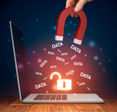 red magnet pulling all the data of an open lock unprotected laptop