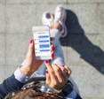 Woman using instant messaging app on mobile phone