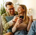 Woman and man looking at phone