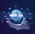 A concept of Web 3.0 -- a virtual world hovering over a human hand with the words &quot;Web 3.0&quot;