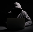 Hacker at laptop