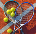 Tennis rackets with tennis balls