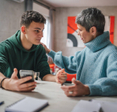 Teenage boy and mom having a discussion.