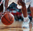 Close up of two pro basketball players jockeying for the basketball 