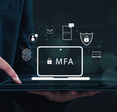 MFA concept: a person holding a laptop with different verification methods displayed above