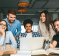 Five diverse teens centered around a school-issued laptop