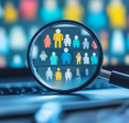 illustration of a magnifying glass looking at different people in front of a computer screen