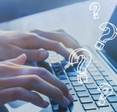 Fingers typing on keyboard with question marks overlayed