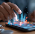 Mobile finance management concept with coins next to a smart phone with 3D digital touch