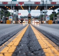 Approaching a busy toll plaze on a highway