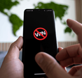 Icon of blocked VPN on a black smartphone screen.
