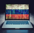 Hacked laptop screen with Russian flag.