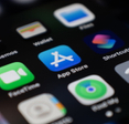 Closeup App Store app on iPhone home screen.