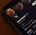Elon Musk Twitter Account page seen in an iPhone