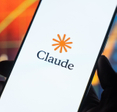 Claude logo displayed on the screen of a smartphone.