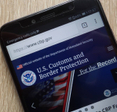 U.S. Customs and Border Protection website displayed on a modern smartphone