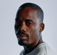 Close up of a man with a laser scan over his eyes.