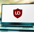 Laptop computer displaying logo of uBlock Origin.