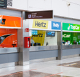 Car rental counters from various rent a car companies in airpot.