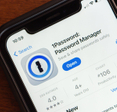 1Password app is displayed in the App Store on an iPhone.