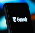 Grindr logo on a smartphone screen.