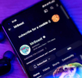 Closeup of smartphone with subscribe page for MrBeast