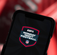 Closeup of a smartphone screen displaying ESPN Monday Night Football logo
