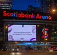 Scotiabank Arena in downtown Toronto illuminated at night