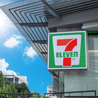 7-Eleven franchise logo sign on building
