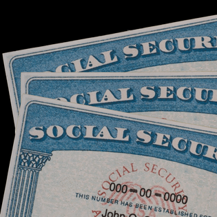 Close up of a stack of SSN cards.