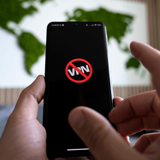 Icon of blocked VPN on a black smartphone screen.