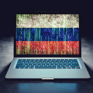 Hacked laptop screen with Russian flag.